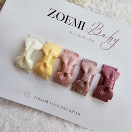  Pink and gold hair clips with floral designs. Suitable for kids.