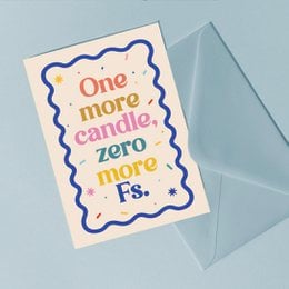 "Birthday card with colorful text 'One more candle, zero more Fs', blue wavy border, humorous birthday greeting"