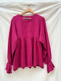  Mauve floral print dress with long sleeves and a leopard print belt.