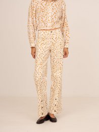  Deer print denim jacket in a vibrant yellow and brown animal print pattern, featuring a collared design and button closure.