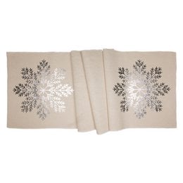 Rectangular table runner with intricate snowflake pattern in silver on a light beige background, approximately 40x155cm in size.