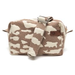  Crossbody Megan Bag 08 is a gift bag with a camouflage pattern in shades of brown and beige. The bag has a rectangular shape and a zipper closure.