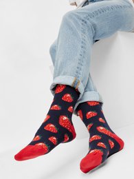 Colorful socks with a strawberry pattern, featuring a navy blue background and bright red strawberries. The socks have a comfortable, stretchy fit and are made from a soft, breathable material.