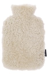  Beige sheepskin-covered hot water bottle, ideal for cozy warmth and comfort.