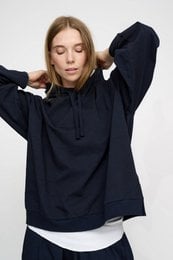 Dark navy hoodie, long sleeves, relaxed fit, comfortable casual sweatshirt for women.