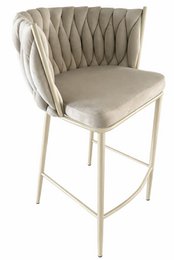 A tall, round barstool with a sand-colored velvet upholstered seat and backrest, and a sand-colored metal frame.