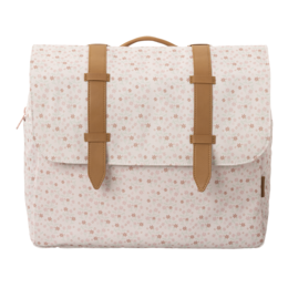 A white backpack with a floral pattern and tan leather straps and accents. The backpack has a flap closure and two side pockets.