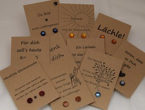 Toll stainless steel earring on card in German language (set10)