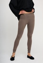 Dark taupe smooth leggings, fitted high-waist style, soft stretchy fabric, women's activewear pants.