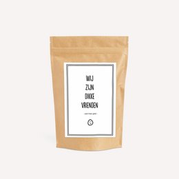 A brown paper bag with the text "We are close friends | TOOT Candy bag" printed on it. The bag contains gummy candies.