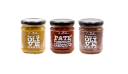 A variety of pâté products in glass jars, including classic pâté and mushroom pâté. The jars have black lids and feature the product name in text.