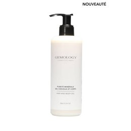 Mineral Purity - Hair and Body Gel, a shower gel product from the Gemology brand. The product features a white bottle with a black pump dispenser, and is described as a hair and body gel.
