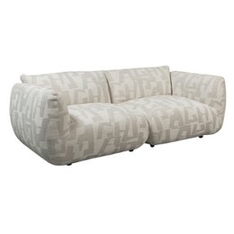  A modern, 2.5 seater sofa in a white and gray geometric pattern fabric. The sofa has a comfortable, plush design with rounded arms and a low profile.