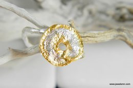 Silver and gold leaf ring with nature-inspired spiral branch design, statement jewelry piece