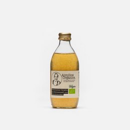 Organic Greek mountain tea in a 0.33l glass bottle. Amber-colored liquid with a natural, earthy aroma.