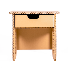 Cardboard open bedside table with single drawer. Rectangular shape, made of cardboard material with a natural, textured finish. Suitable for use as a nightstand or side table in a bedroom.