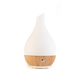 Aroma Diffuser - Bamboo Edition, a sleek and modern essential oil diffuser made of bamboo and white plastic, with a teardrop shape and LED light.