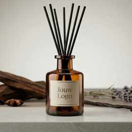 "Cherry blossom reed diffuser, glass bottle with black sticks, natural wood accents, amber and transparent variants"