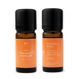 Saffron rose fragrance diffuser refill, amber glass bottle with black cap.