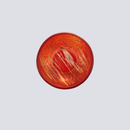  Red ceramic bowl with hand-painted brush strokes, small round shallow dish, rustic artistic design.