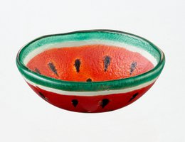  Tropical bowl tray in black, green, and red watermelon colors. Vibrant, round serving dish with watermelon slice design.