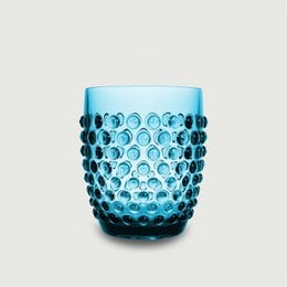 Acrylic drinking cup with a light blue color, featuring a dotted pattern. Durable, lightweight, and unbreakable, making it ideal for use in the garden, picnic, or any casual setting.