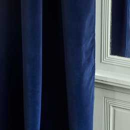  Midnight blue curtains with golden eyelets, suitable for living room decor. Made of high-quality material, available in two sizes.