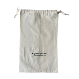 Linen bread bag in a natural, earthy color. Durable and reusable for storing and transporting fresh bread.