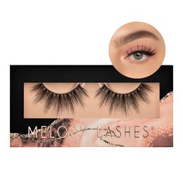 A long, white pearl necklace with a pearl pendant, displayed against a peach-colored background.