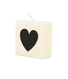 A white square candle with a black heart shape printed on it. This decorative candle is suitable for parties and celebrations.