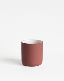 Terracotta espresso cup, 60 ml capacity, simple cylindrical shape, matte red-brown finish.