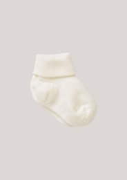 Soft, cozy creamy white wool socks for babies. Available in sizes 14/15, 16/17, 18/19, 20/21, and 22/23.