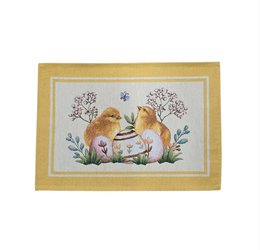  "Yellow gobelin placemat with Easter chicks, flowers, and decorative border design"
