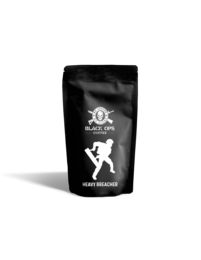 Dark roasted coffee beans in a black package with a white logo depicting a silhouette of a person holding a coffee cup.