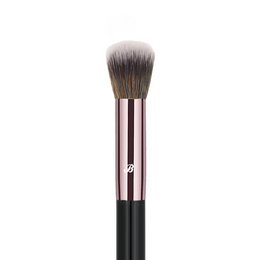 A cream-colored contour makeup brush with a long, tapered handle and soft, dense bristles for precise application and blending.