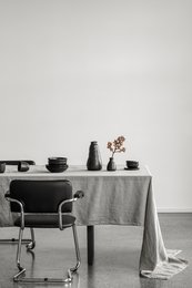 Linen tablecloth in natural beige color, size 330x145 cm, suitable for dining table or kitchen table.