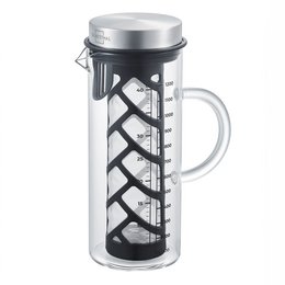 A tall, cylindrical glass cold brew pot with a black filter insert. The pot has measurement markings on the side and appears to be designed for making cold brew coffee or iced tea. The image also shows some coffee beans, suggesting this is a product for cold brew coffee preparation.