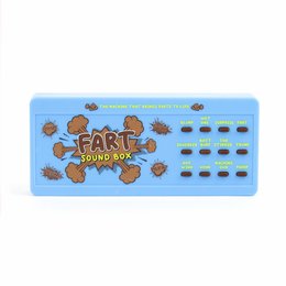 A blue and brown toy box with the text "FART SOUND BOX" and 12 sound buttons. The product is designed for babies and toddlers to play with and make fart sounds.