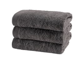 Charcoal grey cotton bath towels, soft and absorbent.