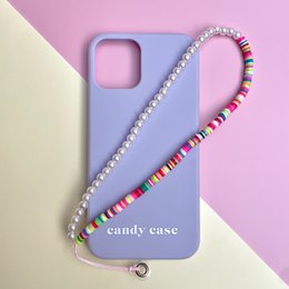 Multicolored telephone cord-inspired smartphone case with a beaded strap.