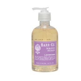 A duo of blood orange-scented hand soap and lotion in a sleek caddy. The soap and lotion feature a vibrant orange color and a refreshing blood orange fragrance.