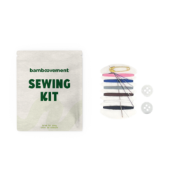 Sewing kit hotel amenity made of plastic-free materials. Includes needles, thread, and buttons in a compact, reusable pouch.