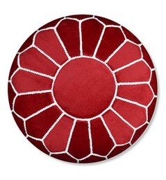  Plush red and white velvet pouffe with a sun-like pattern, suitable as a footstool or decorative piece.