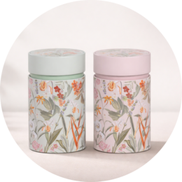 Decorative metal storage boxes with mandala pattern, available in two sizes, suitable for storing small items.