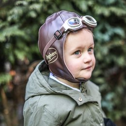 Brown leather pilot's cap and goggles, suitable for children's dress-up or imaginative play.