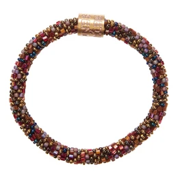 A beaded bracelet with a roll-on closure in a variety of brown tones. The bracelet has a textured, woven design and a metal clasp.