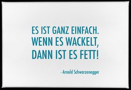 Rectangular magnet with text "ES IST GANZ EINFACH, WENN ES WACKELT, DANN IST ES FETT! - Arnold Schwarzenegger" in German. The magnet appears to be a humorous quote or saying attributed to Arnold Schwarzenegger.