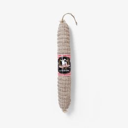 A traditional, cylindrical statue made of a woven, natural material, likely wood or straw. The statue has a red and white checkered label with the text "Maison Cisson" printed on it, indicating this is a product from that brand.