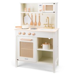 Wooden toy kitchen with rattan details, includes oven, stovetop, and storage shelves.