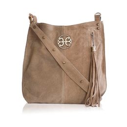 Beige suede shoulder bag with tassel detail and monogram emblem. Stylish and versatile for everyday use.